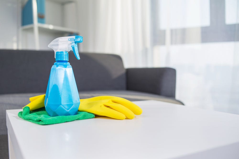 Professional cleaning equipment on a table while doing a commercial clean of a short stay accommodation.