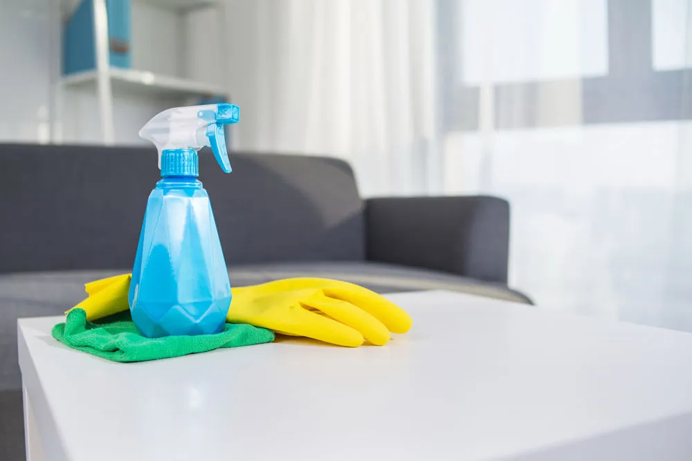 Professional cleaning equipment on a table while doing a commercial clean of a short stay accommodation.